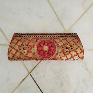 Beaded clutch by Bougainvillea